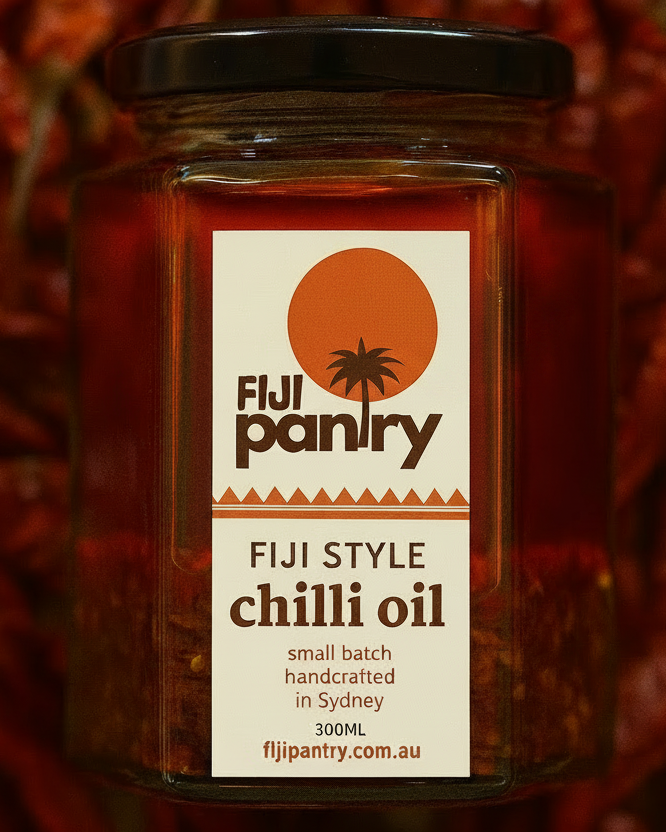 Jar of Fiji Pantry Fiji Style Chilli Oil surrounded by dried chillies